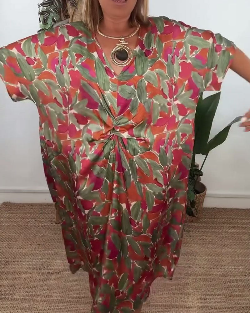 Kleid Mit V-Ausschnitt Und Gedrehtem Print-Design