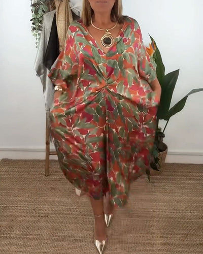 Kleid Mit V-Ausschnitt Und Gedrehtem Print-Design