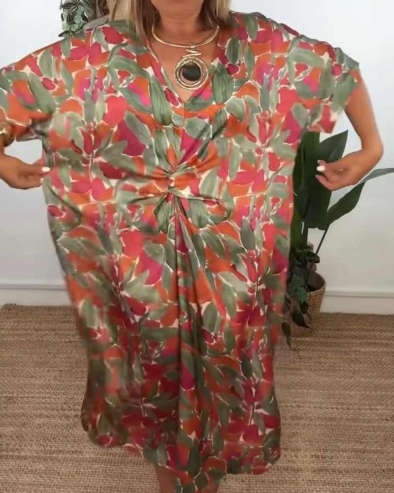 Kleid Mit V-Ausschnitt Und Gedrehtem Print-Design