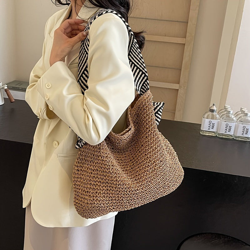 BIRTE - GEFLOCHTENE TASCHE MIT GRIFFEN