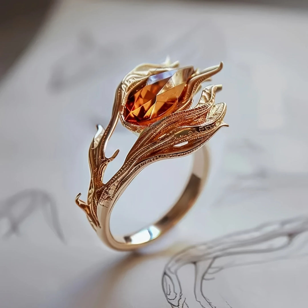 Ring mit orangefarbenem Kristall