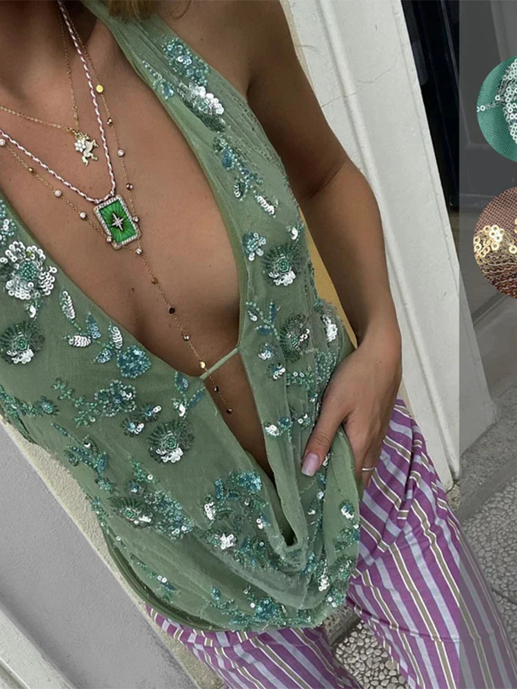 Tief ausgeschnittenes Neckholder-Pailletten Top mit Stickerei