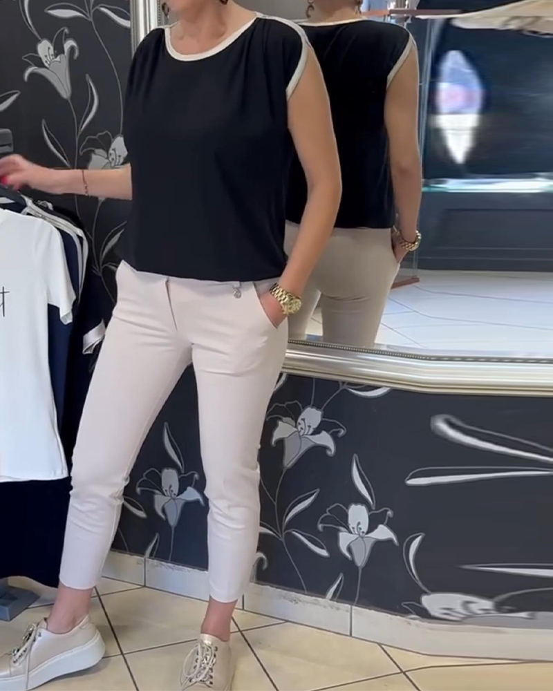 Bluse Kontrastfarbe Ärmellos