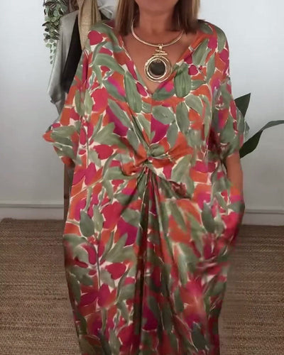 Kleid Mit V-Ausschnitt Und Gedrehtem Print-Design