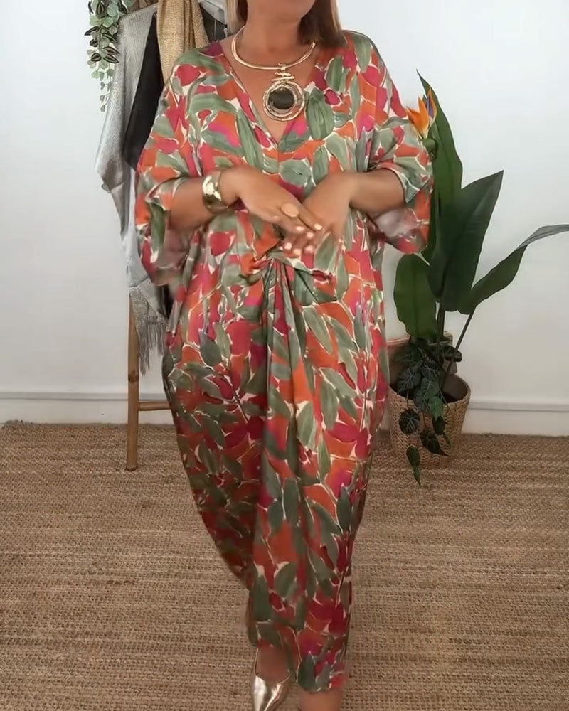 Kleid Mit V-Ausschnitt Und Gedrehtem Print-Design