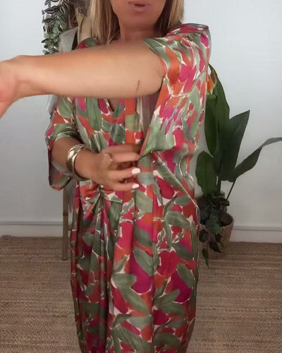 Kleid Mit V-Ausschnitt Und Gedrehtem Print-Design