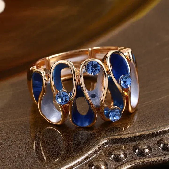 Unregelmäßiger gewellter Ring in Blau und Gold